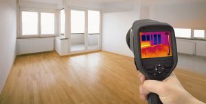 thermal imaging camera being used in snagging survey to check new build home